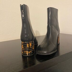 Steve Madden Women’s Leather Booties With Animal Print Heels.